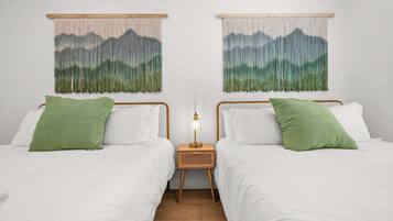 2 bedrooms, desk, iron/ironing board, travel crib