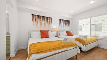 2 bedrooms, desk, iron/ironing board, travel crib