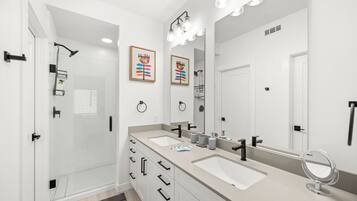 Shower, hair dryer, towels, shampoo