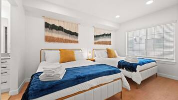 2 bedrooms, desk, iron/ironing board, travel crib