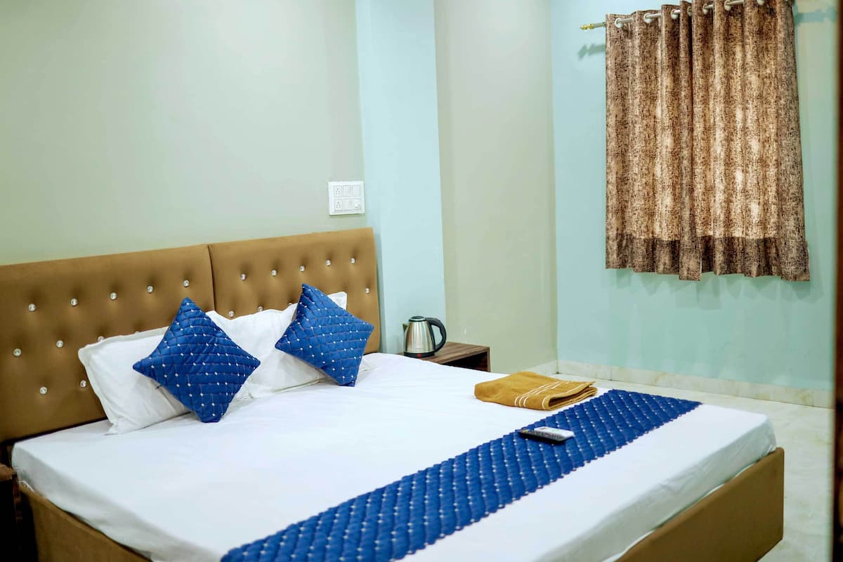 ห้องดีลักซ์ดับเบิล | โต๊ะทำงาน, พื้นที่ทำงานแบบใช้แล็ปท็อป, Wi-Fi ฟรี, ผ้าปูที่นอน