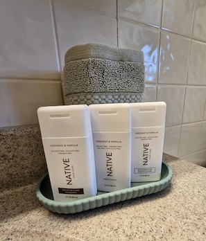Hair dryer, towels, soap, toilet paper