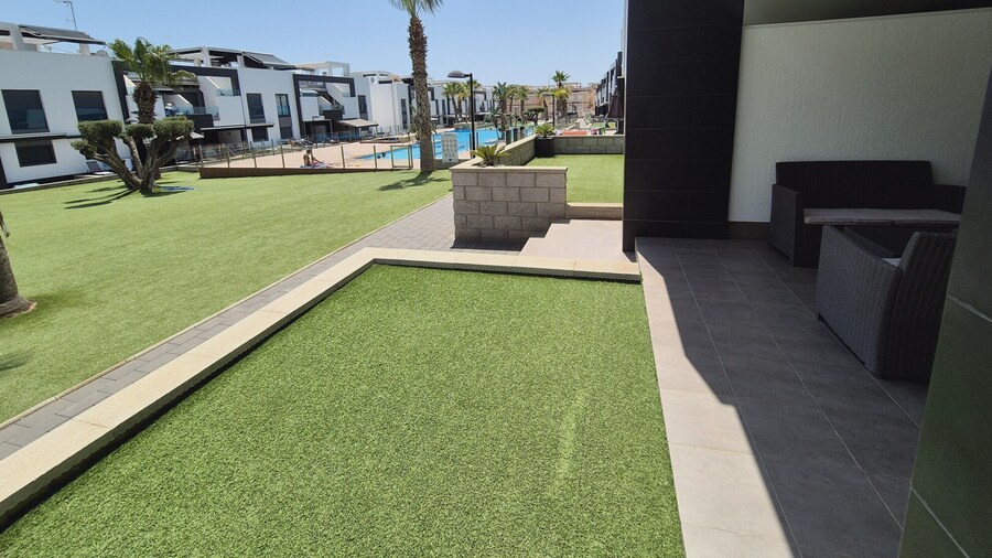 Garden-view Flat in Punta Prima