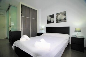 Departamento | 2 habitaciones y tabla de planchar con plancha 