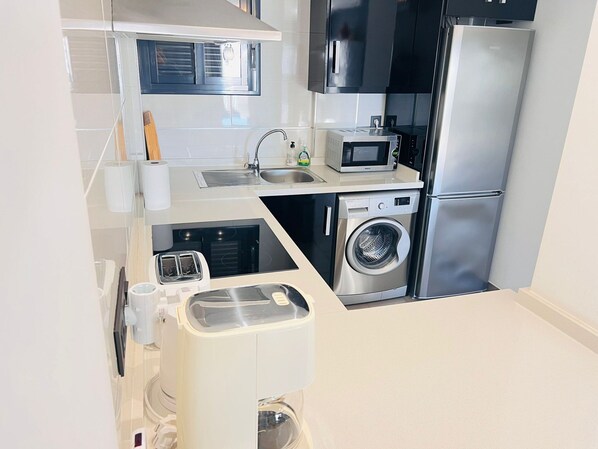 Private kitchen - Family Apartment in La Zenia Resort (Orihuela)