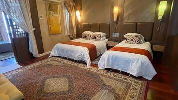 Chambre Triple Premium | Bureau, draps fournis