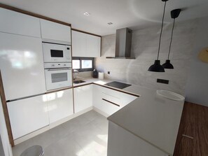 Private kitchen - Sunny Flat With Pool in El Raso (Guardamar del Segura)