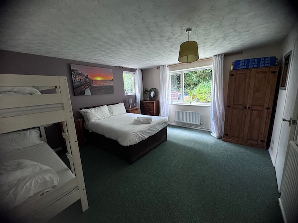2 bedrooms, desk, laptop workspace, iron/ironing board
