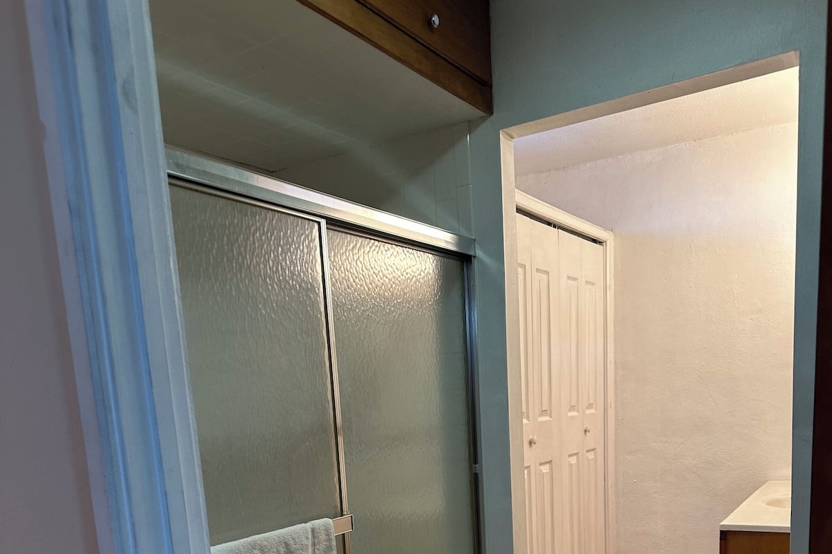 Condo | Bathroom | Combined shower/tub, towels, soap, toilet paper