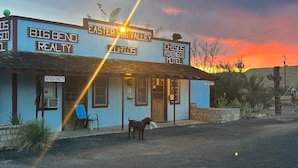 A motel with a sign reading "Easter Egg Valley" and "Chisos Mining Co. Motel". - Chisos Mining Co Motel (Terlingua)