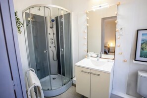 Hair dryer, towels, soap, toilet paper