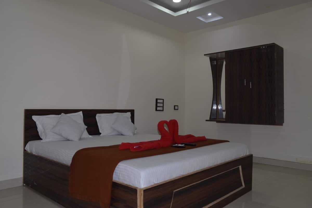 Habitación Deluxe con 1 cama matrimonial o 2 individuales, vista al jardín | Escritorio y wifi gratis
