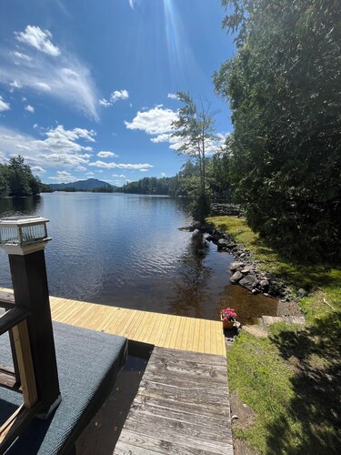 Charming 2-bedroom cabin on the water! Featuring boathouse and dock Saranac Lake