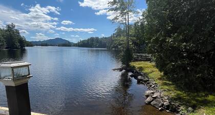 Charming 2-bedroom cabin on the water! Featuring boathouse and dock Saranac Lake