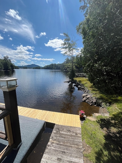 Charming 2-bedroom cabin on the water! Featuring boathouse and dock Saranac Lake
