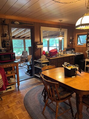 Fridge, microwave, stovetop, coffee/tea maker