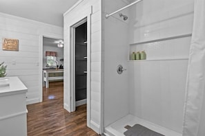 Shower, hair dryer, towels, soap