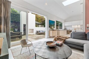 TV, fireplace, books, stereo