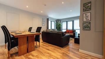 Comfort Apartment | Living area | Flat-screen TV