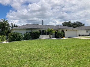 Exterior - Spacious 3-bedroom home with backyard oasis, private heated pool, close to beach (Cape Coral)