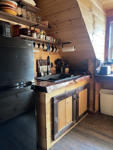 Charming cabin in wonderful New Sweden with 80 acres of woods and trails