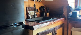 Charming cabin in wonderful New Sweden with 80 acres of woods and trails