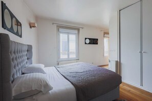 1 bedroom, laptop workspace, iron/ironing board, bed sheets