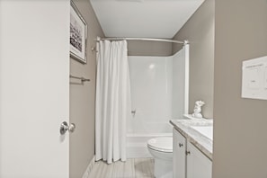 Hair dryer, towels, soap, toilet paper
