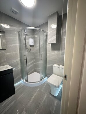 Hair dryer, towels, soap, toilet paper