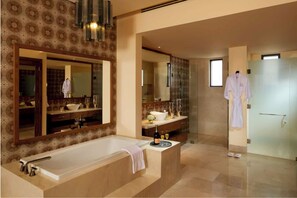 Regadera, secadora de cabello, bidet, toallas 