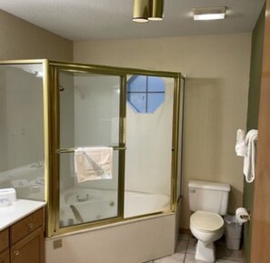 Jetted tub, hair dryer, towels, soap