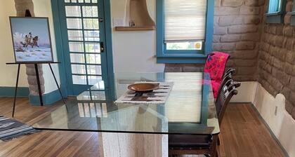 The Cervantes house is a traditional 1800s adobe casa showcasing NM art