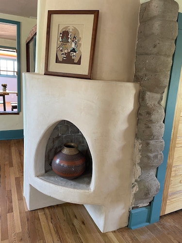 The Cervantes house is a traditional 1800s adobe casa showcasing NM art