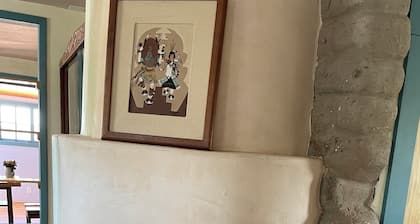The Cervantes house is a traditional 1800s adobe casa showcasing NM art