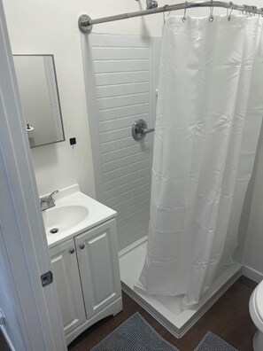 Hair dryer, towels, soap, shampoo