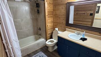 Jetted tub, hair dryer, towels, soap