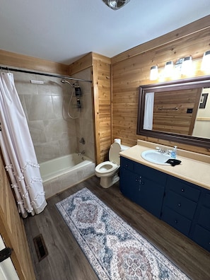 Jetted tub, hair dryer, towels, soap