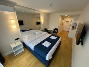 Deluxe Studio, Beach View | In-room safe, desk, free WiFi