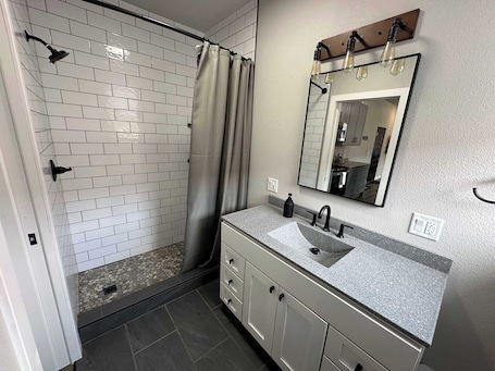 Shower, hair dryer, towels. Downtown Minimalist Apartment