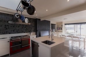 Coffee/tea maker, toaster, dining tables