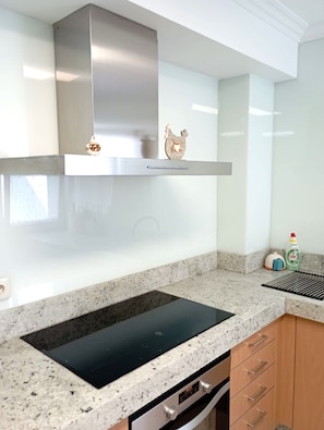 Fridge, microwave, oven, cookware/dishes/utensils