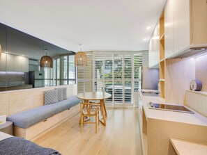 Deluxe appartement, 1 slaapkamer | Woonruimte