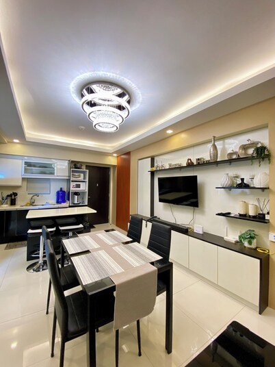 Cozy condo in welcoming Davao City with fitness room, AC