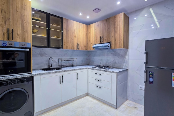 Appartement, vue golf | Cuisine privée | Grand réfrigérateur, four, plaque de cuisson