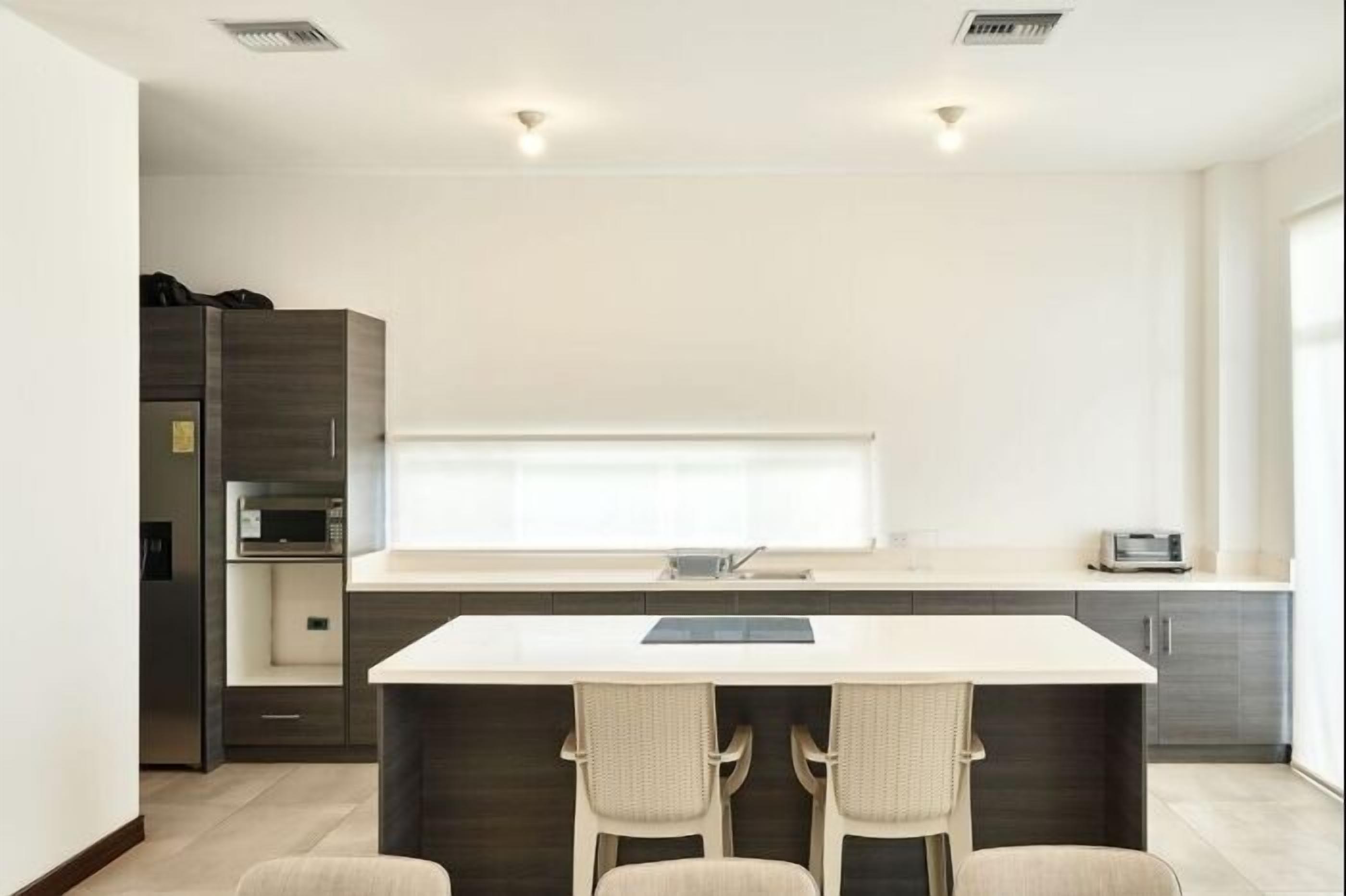 Microwave, oven, coffee/tea maker, cookware/dishes/utensils