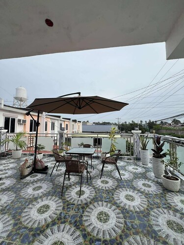 Charming Bed & Breakfast Room #1 with WiFi and AC in Delightful Compostela Cebu