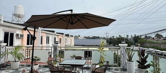 Charming Bed & Breakfast Room #1 with WiFi and AC in Delightful Compostela Cebu