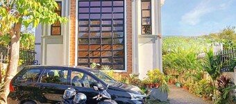 Charming Bed & Breakfast Room #1 with WiFi and AC in Delightful Compostela Cebu