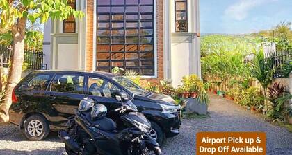 Charming Bed & Breakfast Room #1 with WiFi and AC in Delightful Compostela Cebu
