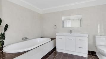 Basic Quadruple Room, Balcony, Lake View | Bathroom | Slippers